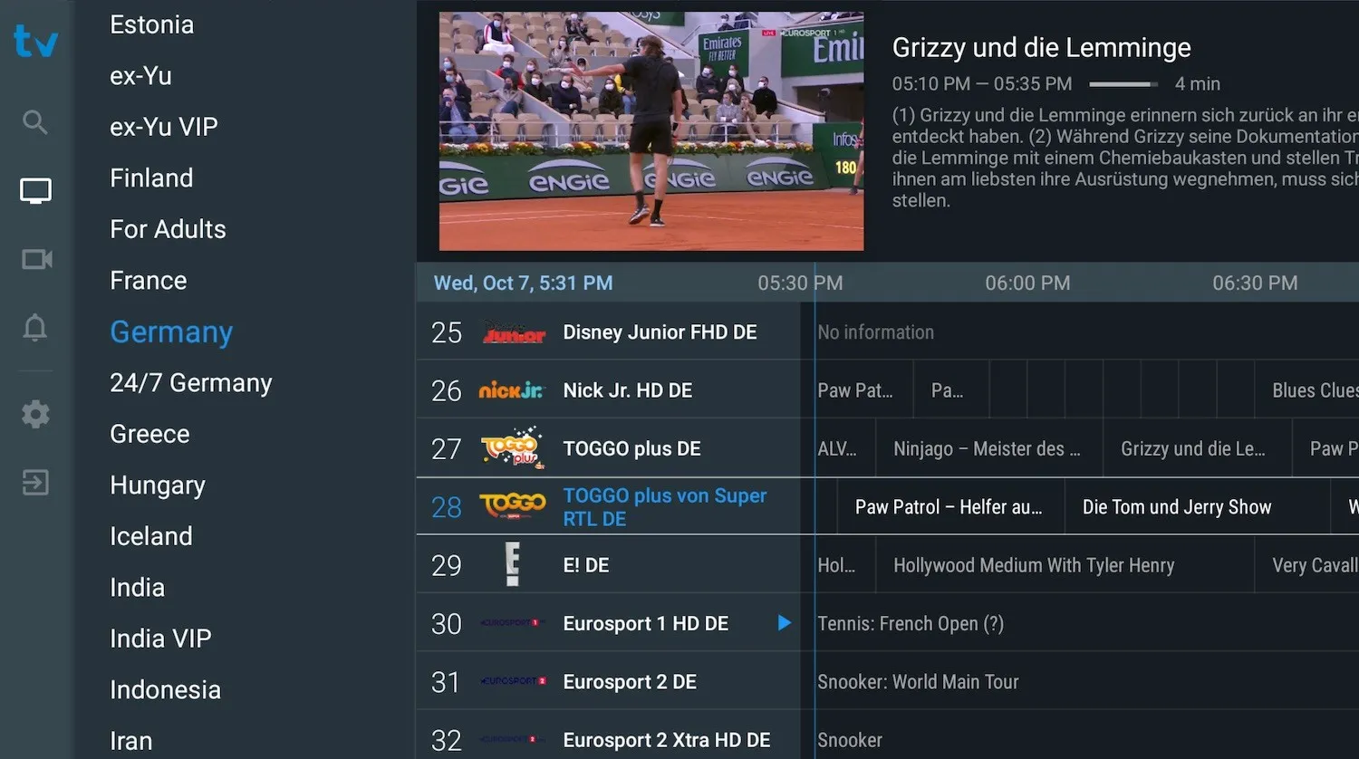TiviMate channel list with the program guide grid showing channels and their schedules