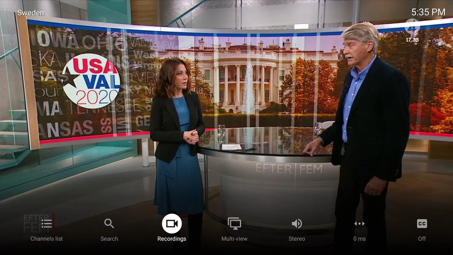 Live TV playback in TiviMate with the on-screen playback controls bar