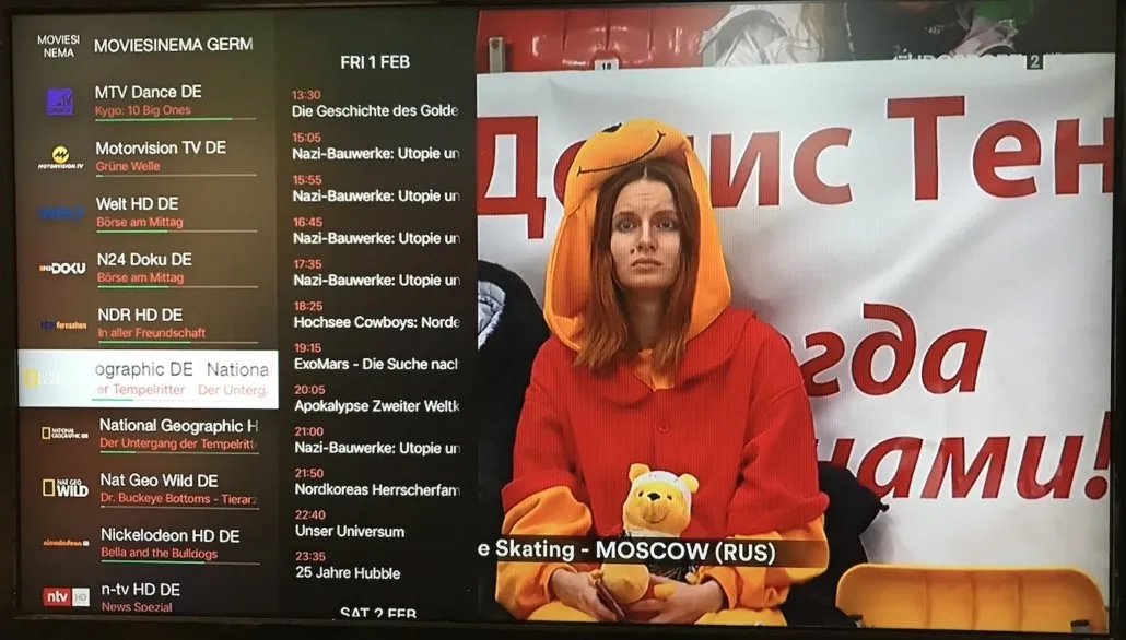 iPlayTV TV Guide on Apple TV showing the EPG with program listings across channels